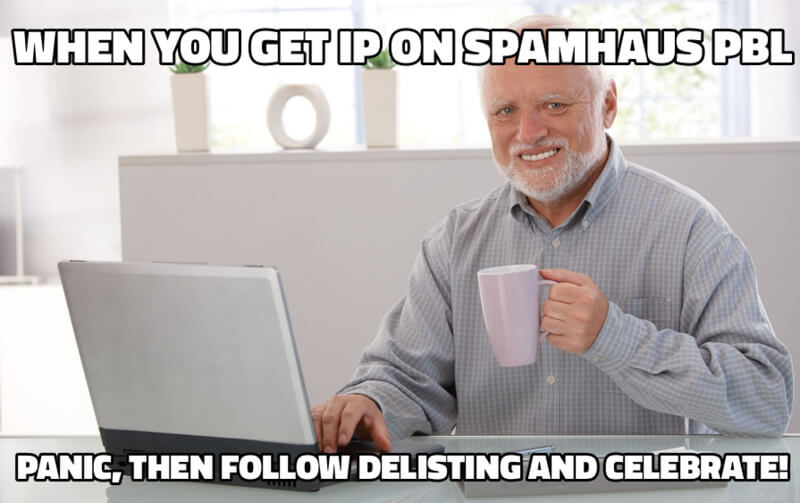 Step-by-Step Guide to Removing Your IP from the Spamhaus PBL Blacklist 2 A smiling man sitting at a desk with a laptop, holding a purple mug. Text above reads, When you get IP on Spamhaus PBL, and below, Panic, then follow delisting and celebrate!.
